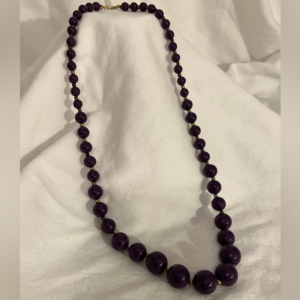 Long vintage purple beaded necklace.